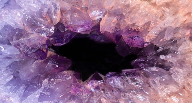 Amethyst You'll never guess the stone hosting these beautiful crystals